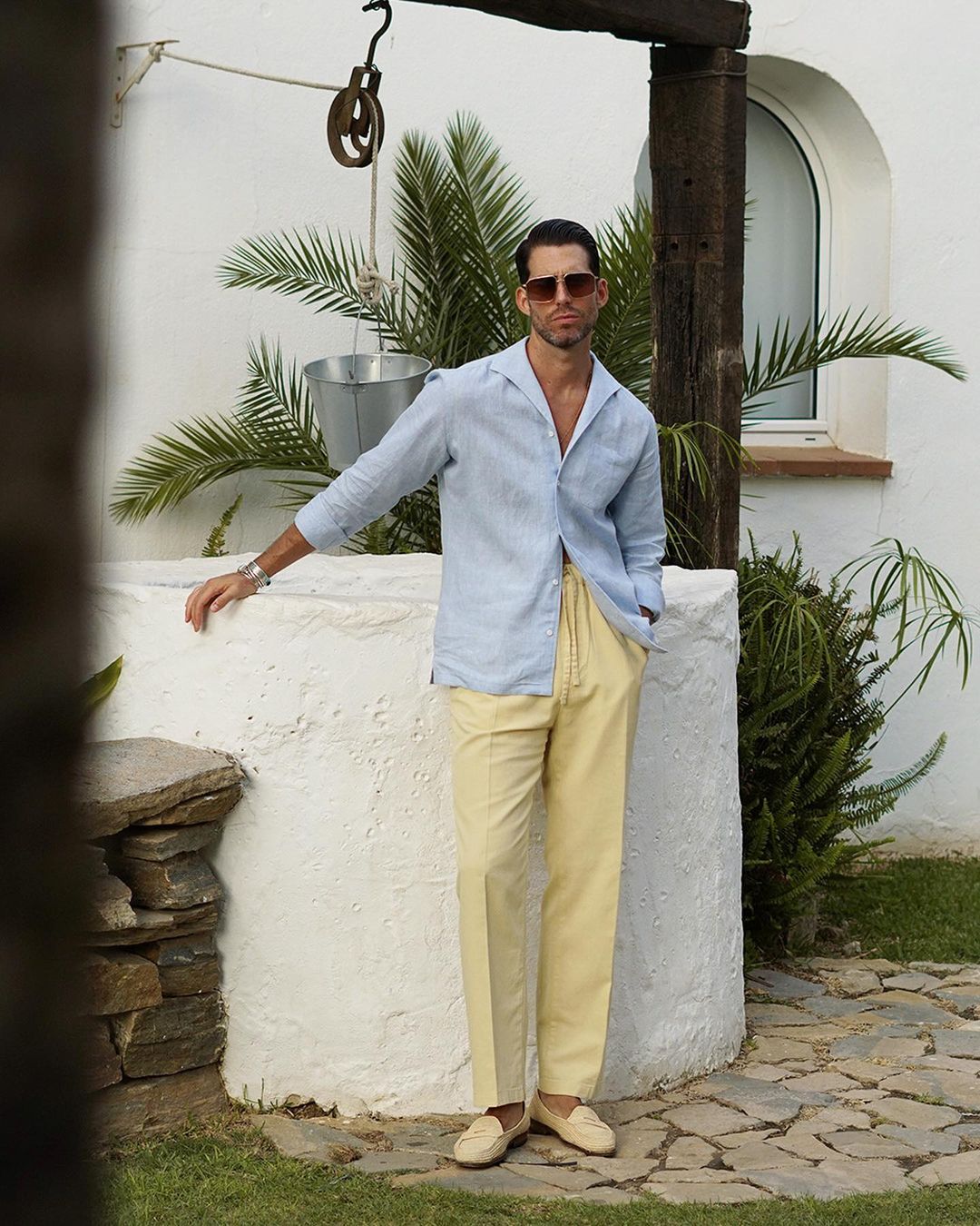 Model wearing the custom linen shirt for men in powder blue by Luxire Clothing 3
