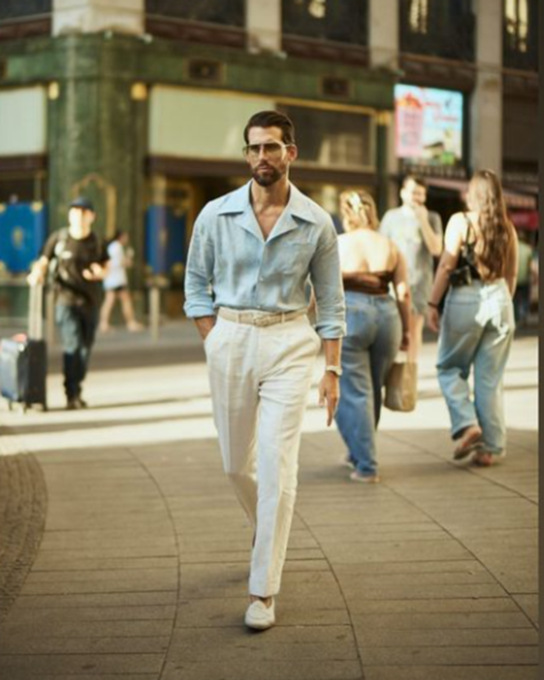 Model wearing the custom linen shirt for men in sky blue with collar by Luxire Clothing 3