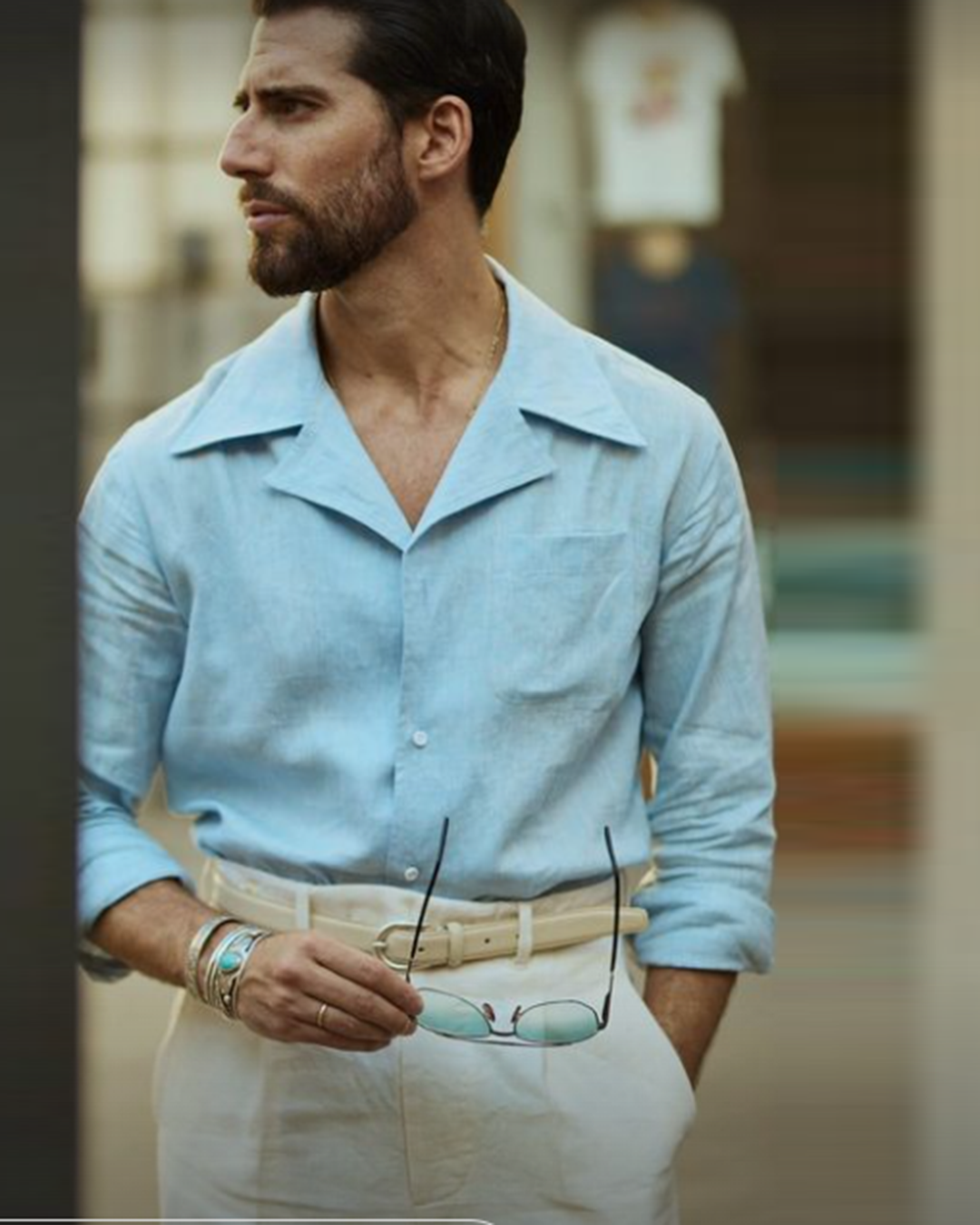 Model wearing the custom linen shirt for men in sky blue with collar by Luxire Clothing 4