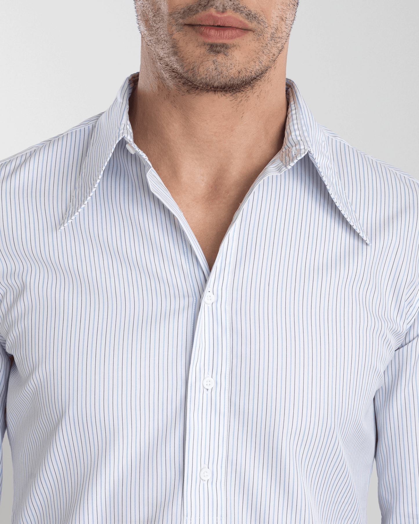 Blue and Black Pin Stripes On White Shirt
