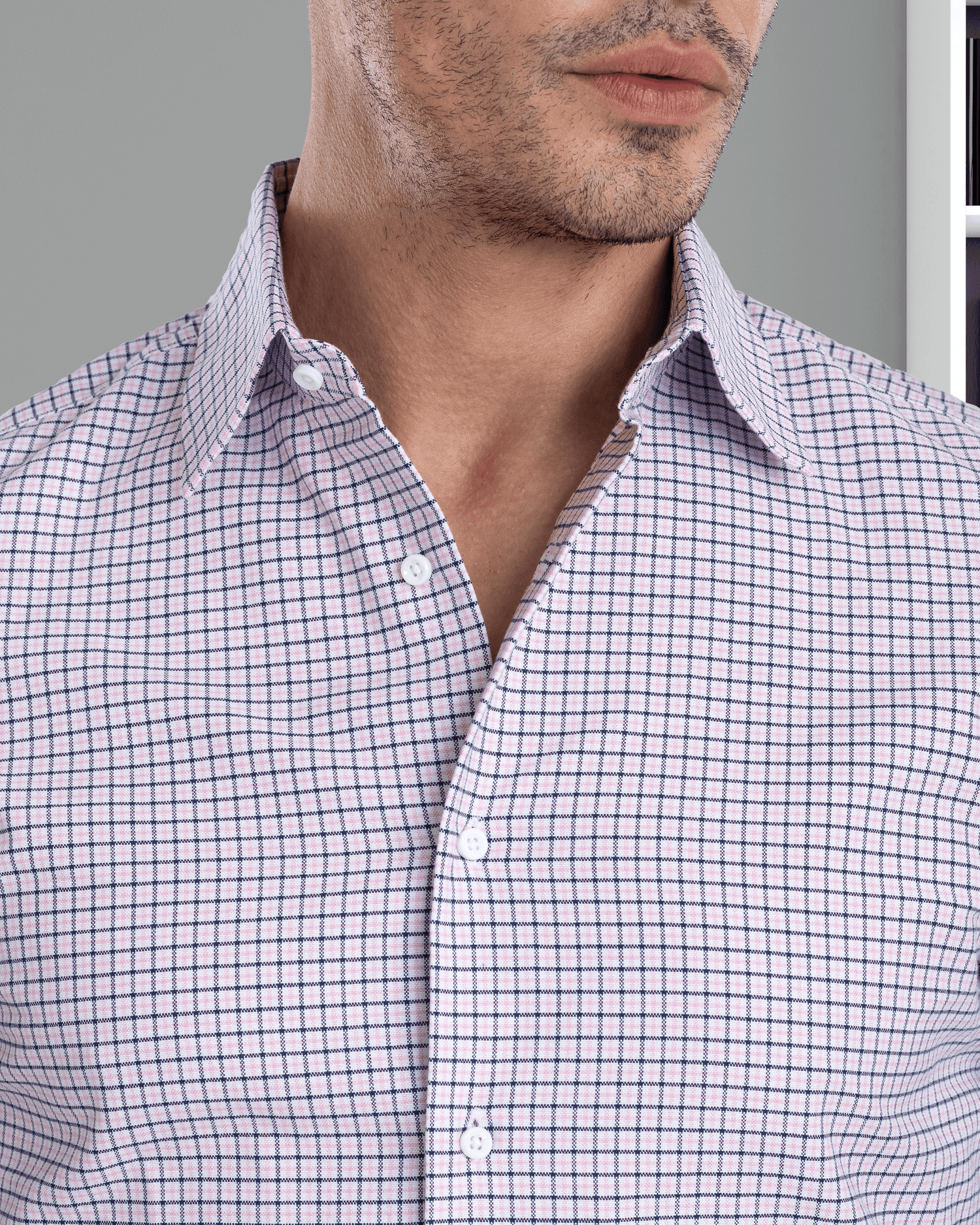 Model close up wearing custom check shirts for men by Luxire navy pink tattersall