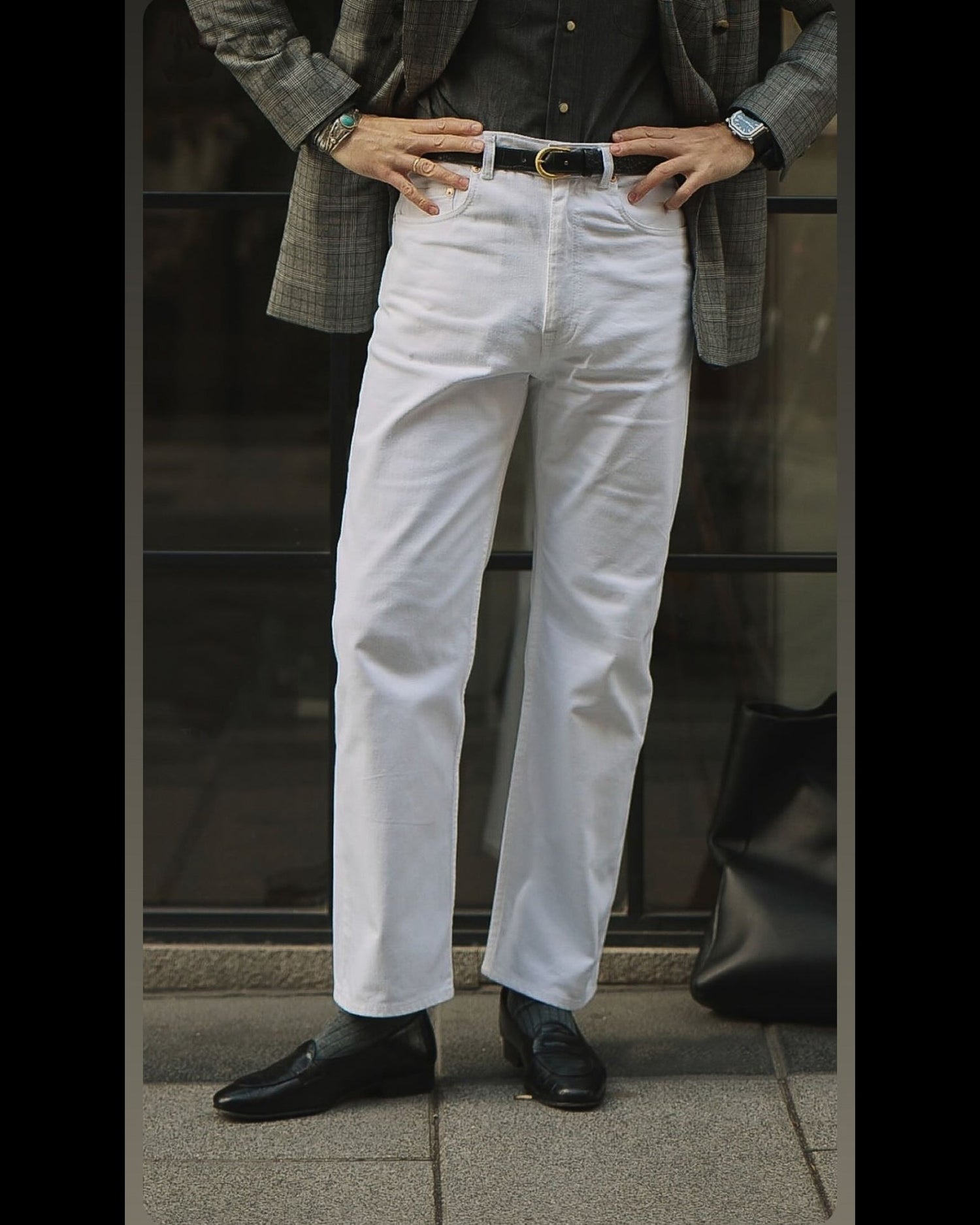 Model wearing mens heavy twill jeans by Luxire in white