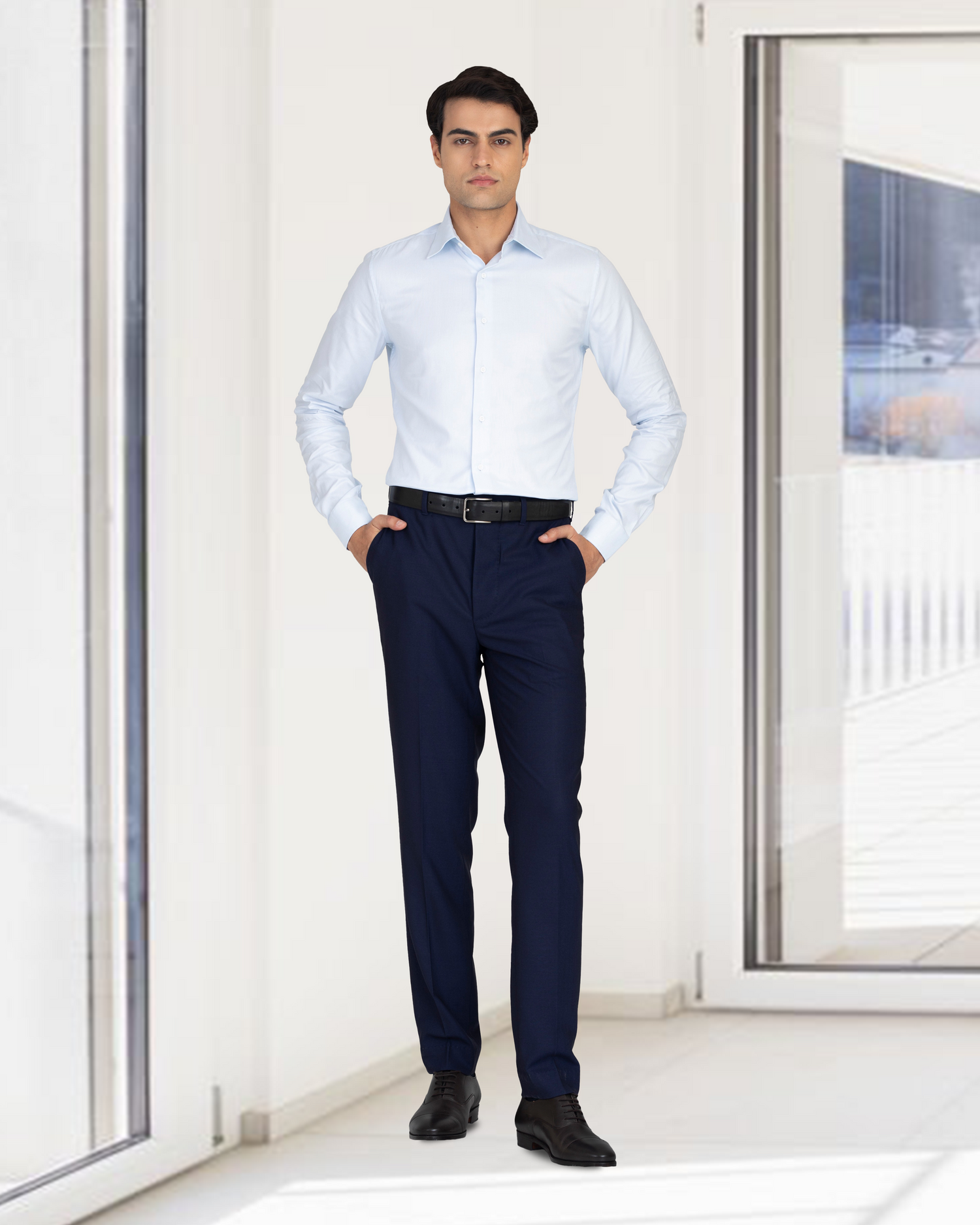 Model wearing the custom oxford shirt for men by Luxire in brembana business blue royal 3