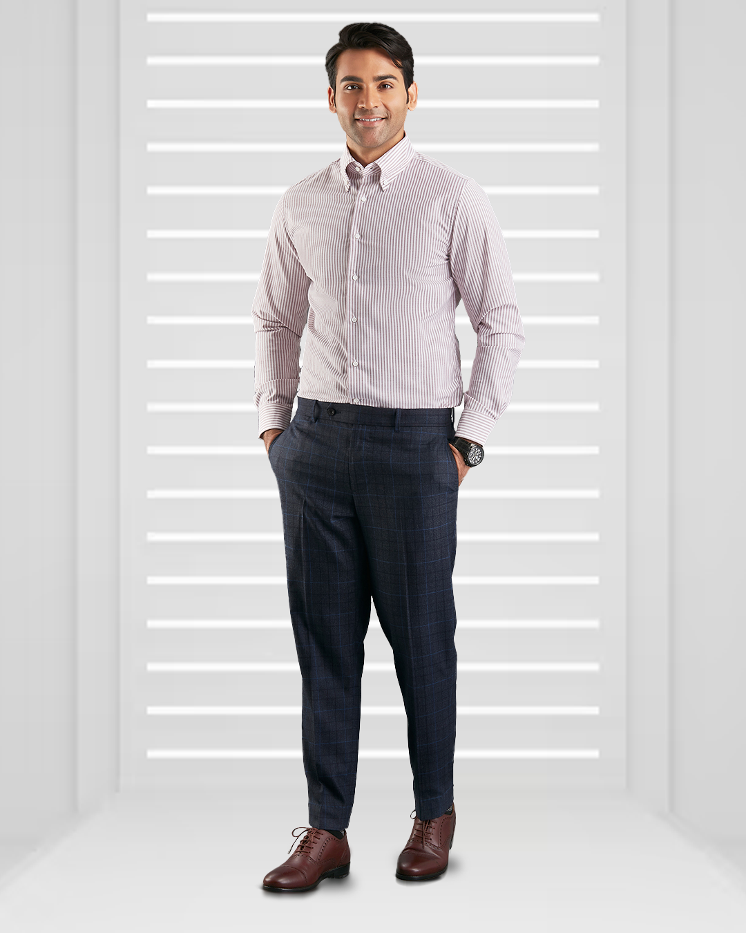 Model wearing the custom oxford shirt for men by Luxire in white with maroon university stripes hands in pockets