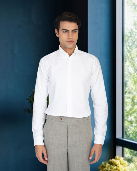 Model wearing the custom oxford shirt for men by Luxire in warzone white
