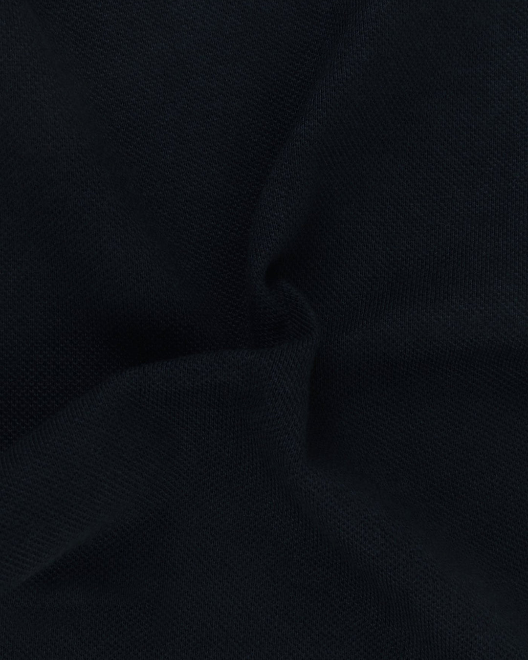 Close up fabric of the custom oxford polo shirt for men by Luxire in dark blue