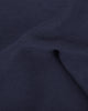 Close up of the custom oxford polo shirt for men by Luxire in midnight blue