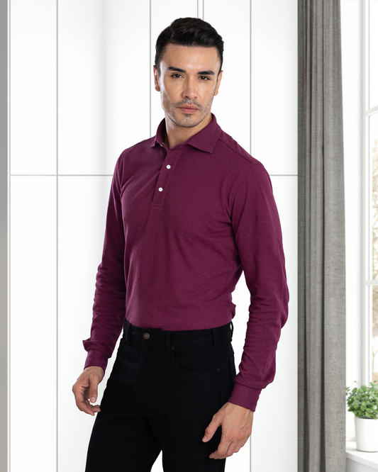 Model wearing the custom oxford polo shirt for men by Luxire in purple hands at side