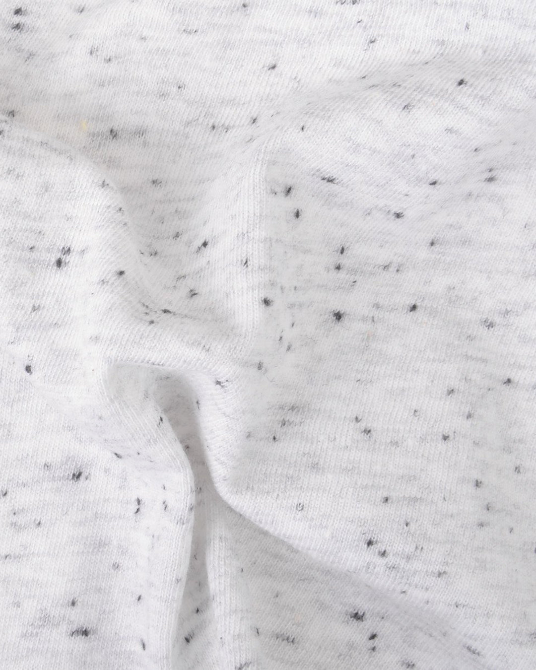 Close up of the custom oxford polo shirt for men by Luxire in speckled white 2