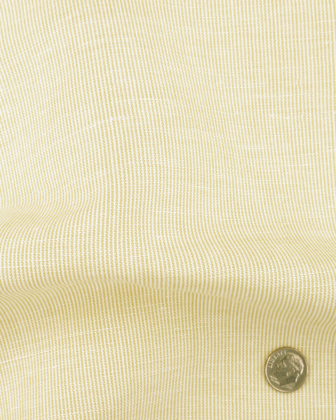 Close up of the custom linen shirt for men in pastel yellow by Luxire Clothing 2
