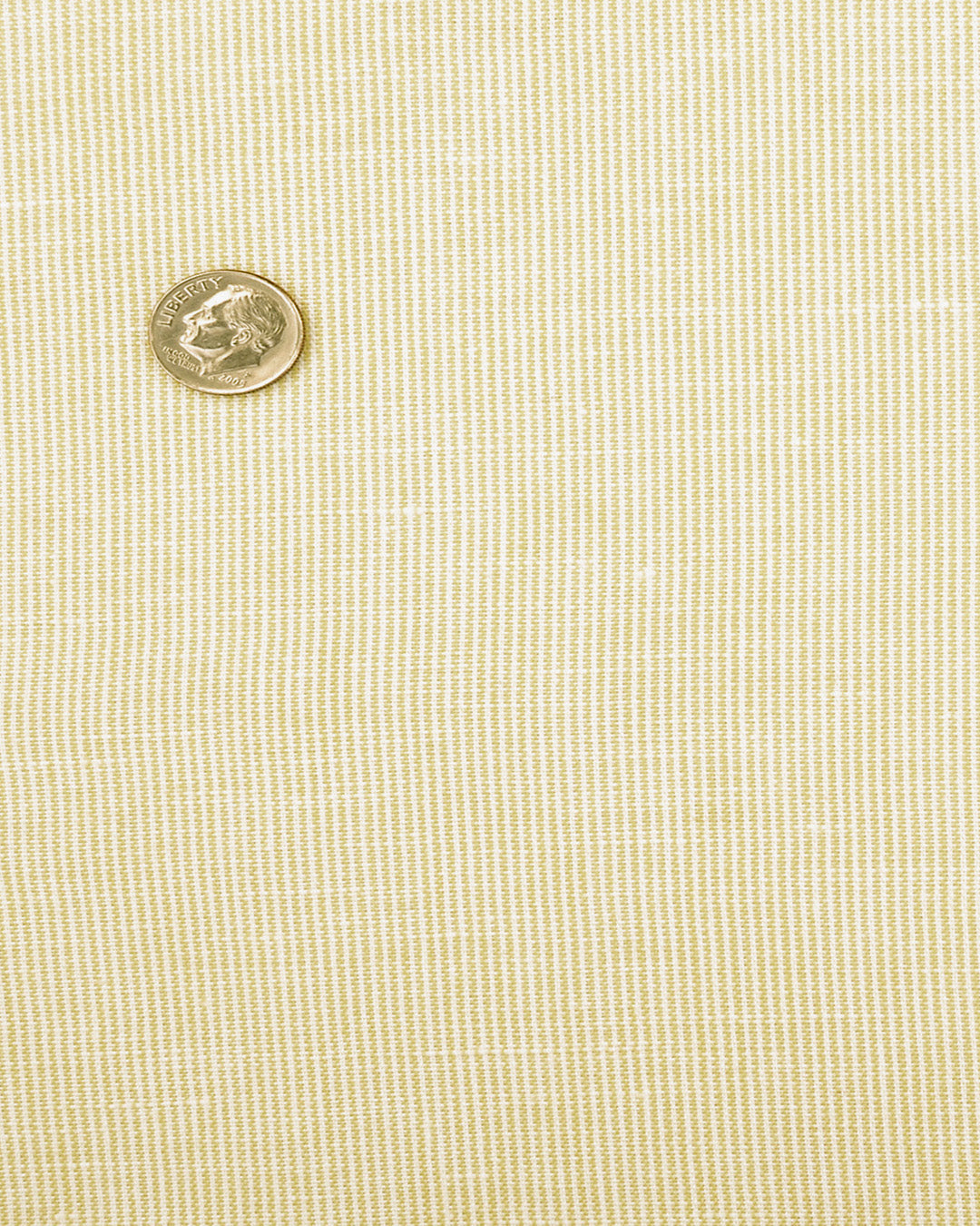 Close up of the custom linen shirt for men in pastel yellow by Luxire Clothing 3
