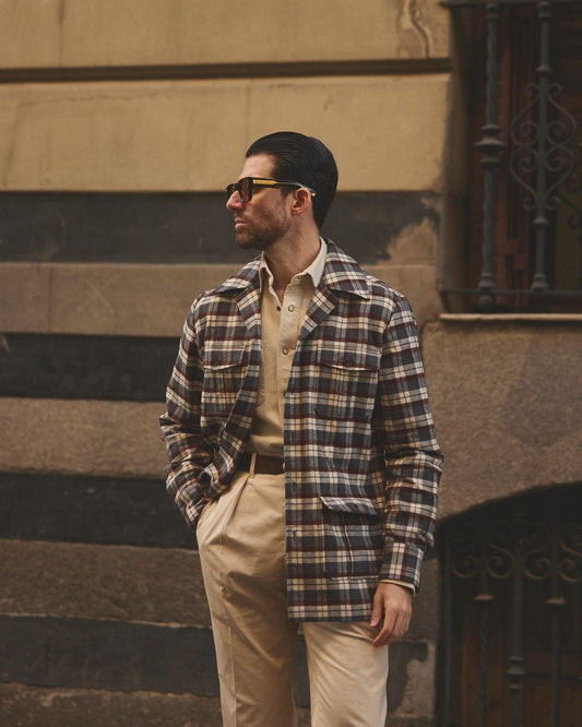 Front of model wearing the flannel shirt jacket for men by Luxire in brown and ecru checks