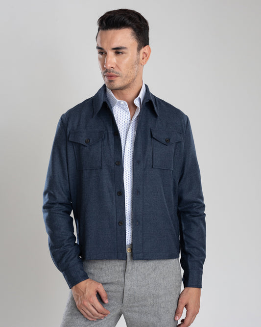 Model wearing the wool flannel shirt jacket for men by Luxire in dugdale navy