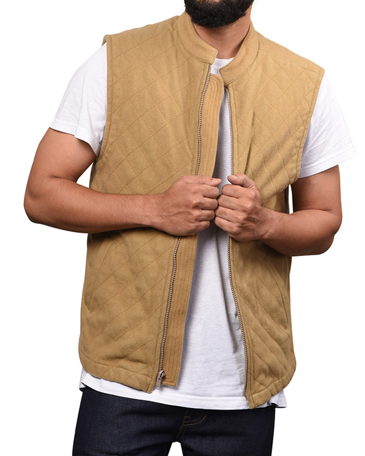 Model wearing the wool flannel vest for men by Luxire quilted in camel