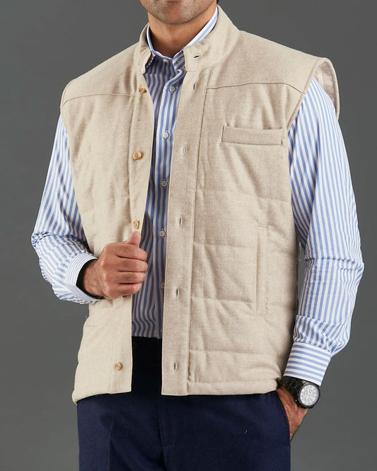 Model wearing the flannel quilted vest for men by Luxire in ecru